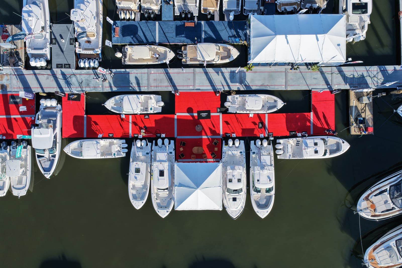 RT 113's boats on the red-carpet docks at the Annapolis Powerboat Show, seen from above